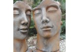 Visage homme demi rouille en déco jardin.