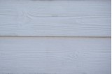 Zoom sur le motif moulé imitation bois des plaques béton Séquoia